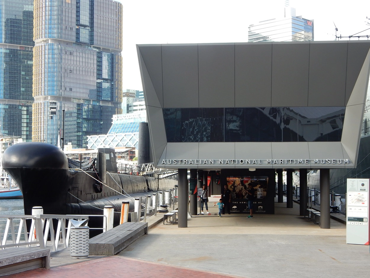 A submarine parked next to the Maritime Museum 