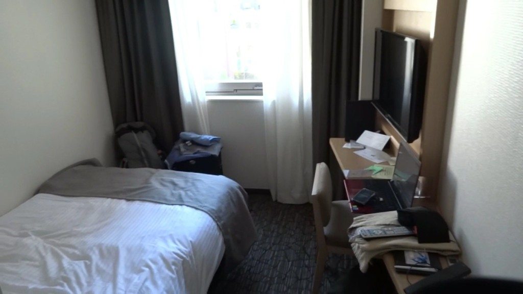 This is the tiny room I rented in business hotel. Barely enough room for the bed.