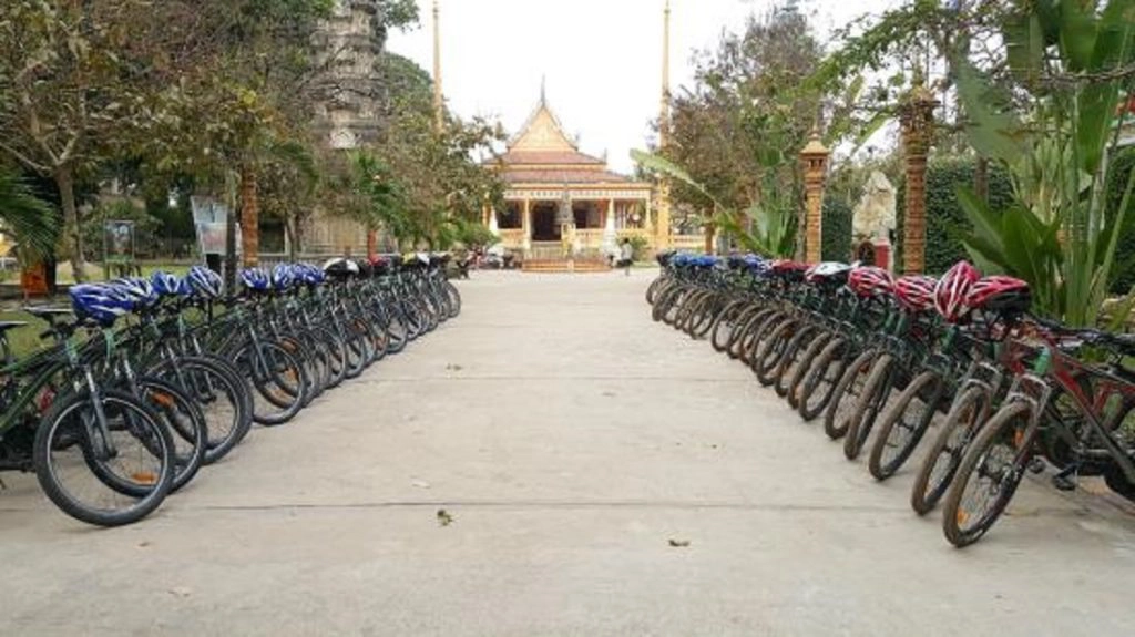 Rent a bike for a couple hours and ride near the river and around town